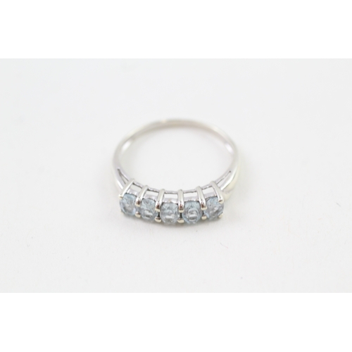 72 - 9ct gold blue topaz eternity ring (1.8g) Size  P