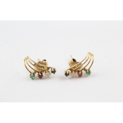 83 - 14ct gold emerald, ruby, sapphire and cubic zirconia stud earrings (1.4g)