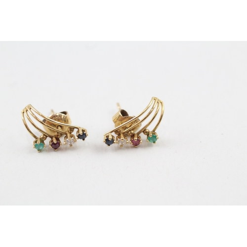 83 - 14ct gold emerald, ruby, sapphire and cubic zirconia stud earrings (1.4g)