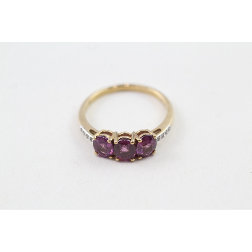 85 - 9ct gold purple garnet & diamond dress ring (1.9g) Size  N 1/2