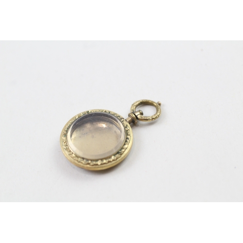 90 - 9ct gold antique patterned locket (3.4g)