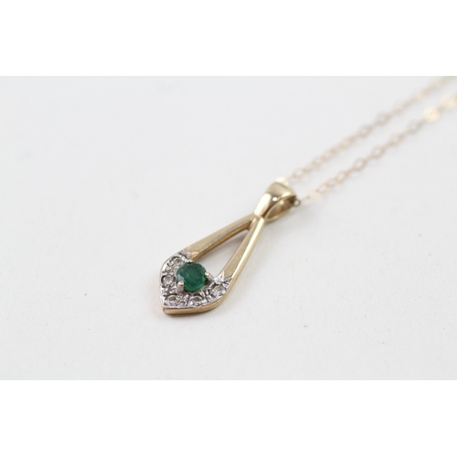 91 - 9ct gold emerald and diamond pendant with 9ct gold chain (1.5g)