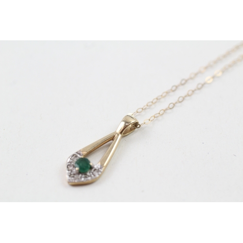 91 - 9ct gold emerald and diamond pendant with 9ct gold chain (1.5g)