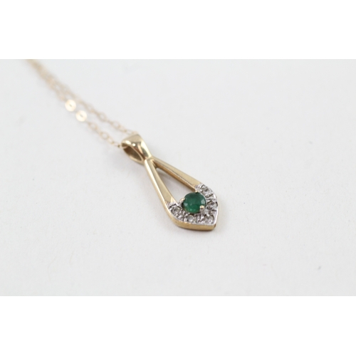 91 - 9ct gold emerald and diamond pendant with 9ct gold chain (1.5g)