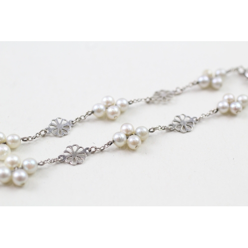 93 - 9ct white gold cultured pearl fancy link bracelet with 1 bead replaced by a faux pearl (2.6g)