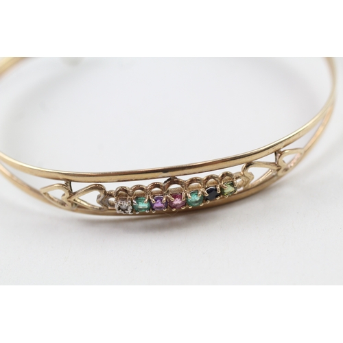 94 - 9ct gold 'DEAREST' gemstone bangle inc. diamond, emerald, amethyst, ruby, sapphire & tourmaline (5.3... 