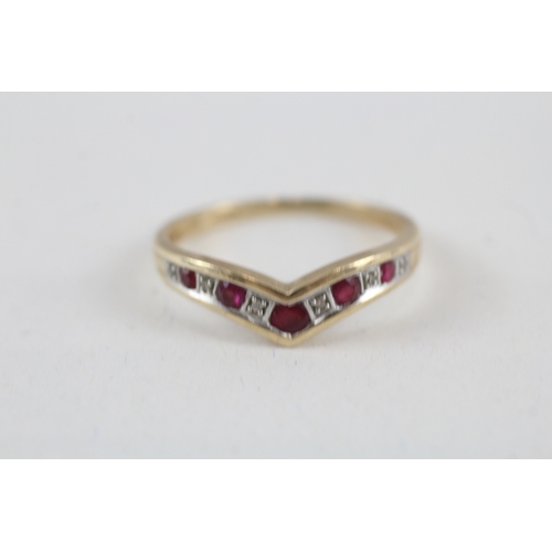 102 - 9ct gold ruby and diamond wishbone dress ring (2.4g) Size  V