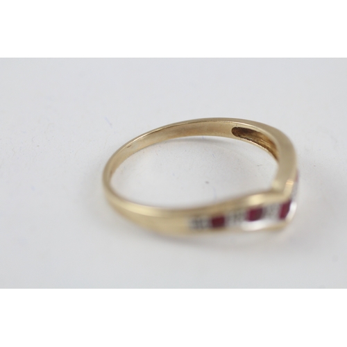 102 - 9ct gold ruby and diamond wishbone dress ring (2.4g) Size  V