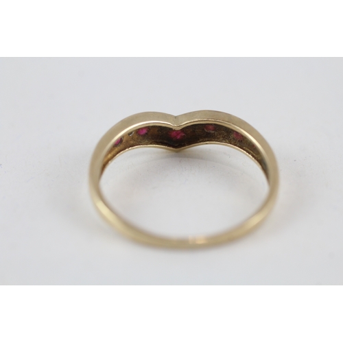 102 - 9ct gold ruby and diamond wishbone dress ring (2.4g) Size  V