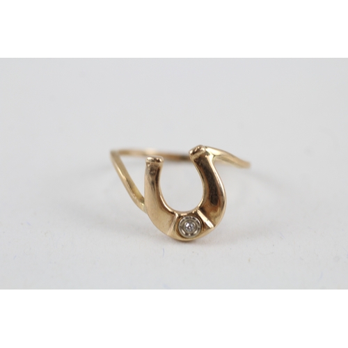 108 - 9ct gold diamond horseshoe dress ring (1.5g) Size  L