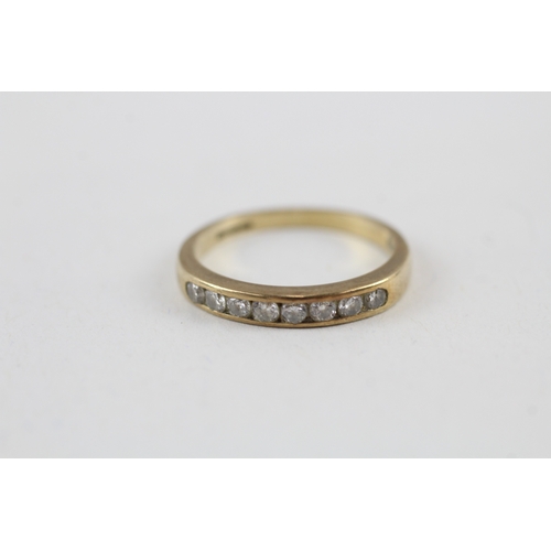 110 - 9ct gold diamond channel set half eternity dress ring (1.9g) Size  M