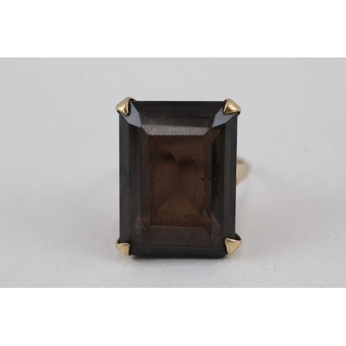 112 - 9ct gold smokey quartz cocktail ring (6.4g) Size  I