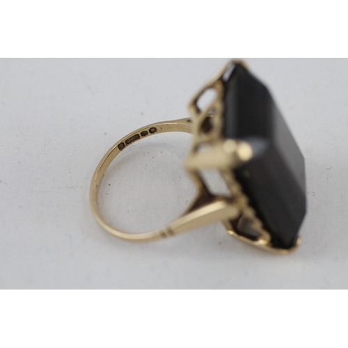 112 - 9ct gold smokey quartz cocktail ring (6.4g) Size  I