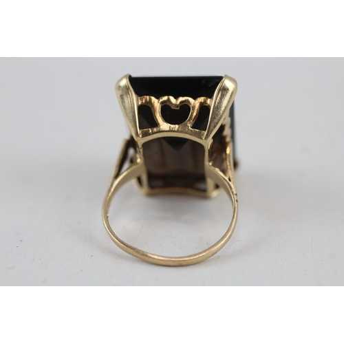 112 - 9ct gold smokey quartz cocktail ring (6.4g) Size  I