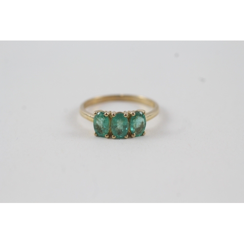 116 - 10ct gold emerald trilogy dress ring (2g) Size  N 1/2