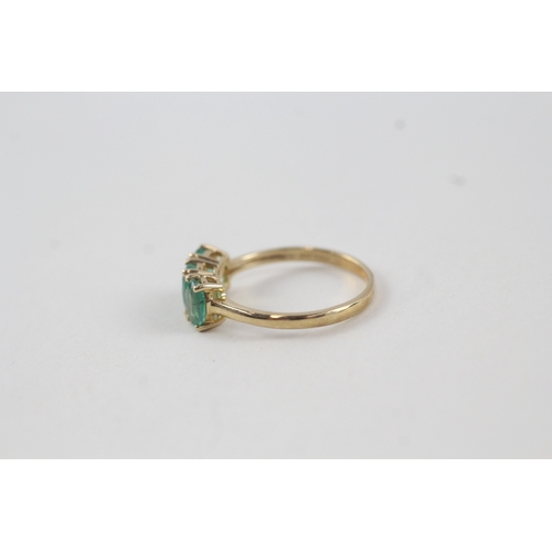 116 - 10ct gold emerald trilogy dress ring (2g) Size  N 1/2