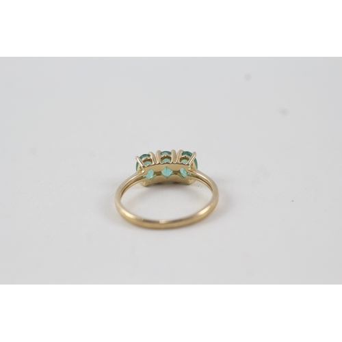 116 - 10ct gold emerald trilogy dress ring (2g) Size  N 1/2