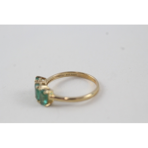 116 - 10ct gold emerald trilogy dress ring (2g) Size  N 1/2