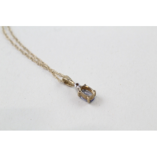 15 - 9ct gold tanzanite and diamond pendant with 9ct gold chain (1.4g)