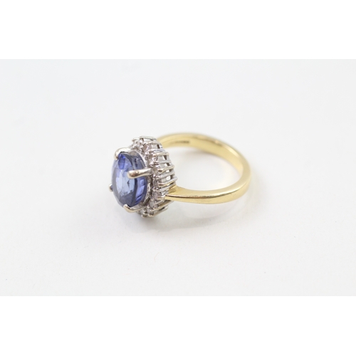 25 - 18ct gold diamond sapphire halo ring (8.3g) Size  N