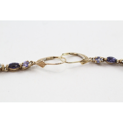 29 - 9ct gold blue gemstone earrings (2.2g)