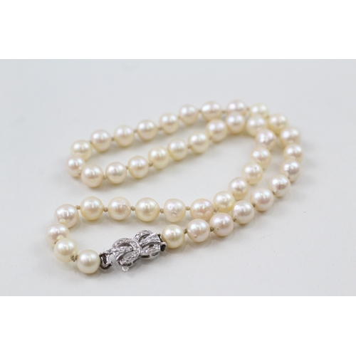 3 - 18ct gold pearl necklace with diamond clasp (25.7g)