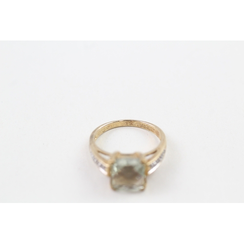 37 - 9ct gold blue gemstone & diamond ring (3.8g) Size  N