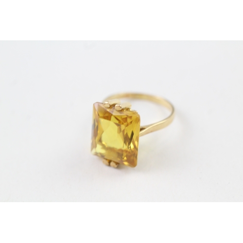 39 - 18ct gold yellow sapphire dress ring (5.2g) Size  M