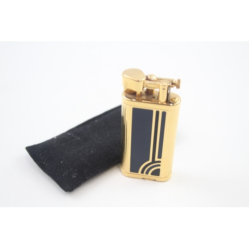 399 - A Dunhill 'UNIQUE' Gold Plated Lift Arm Pocket Lighter w/ Art Deco Enamel Finish