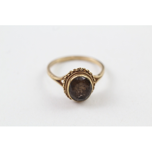 55 - 9ct gold smoky quartz ring (3g) Size  R