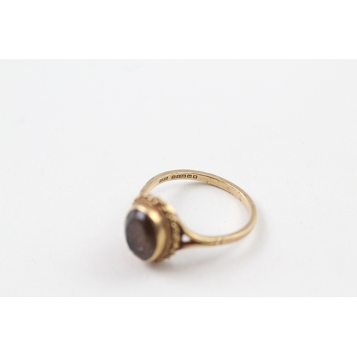 55 - 9ct gold smoky quartz ring (3g) Size  R