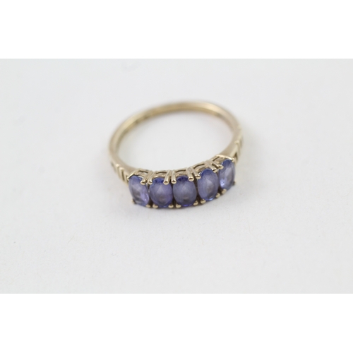 58 - 9ct gold tanzanite ring (1.6g) Size  L