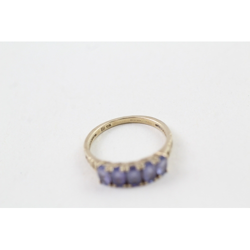 58 - 9ct gold tanzanite ring (1.6g) Size  L