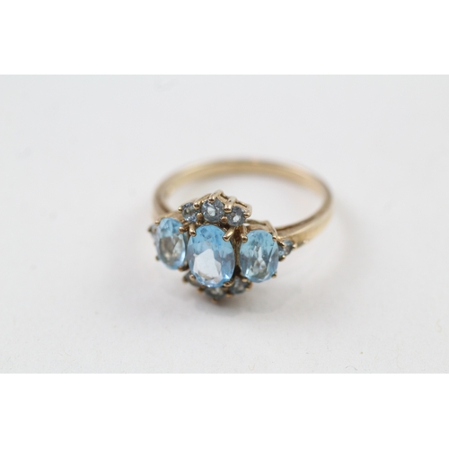 60 - 9ct gold blue topaz ring (2.7g) Size  N