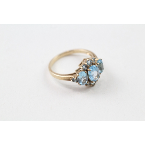 60 - 9ct gold blue topaz ring (2.7g) Size  N