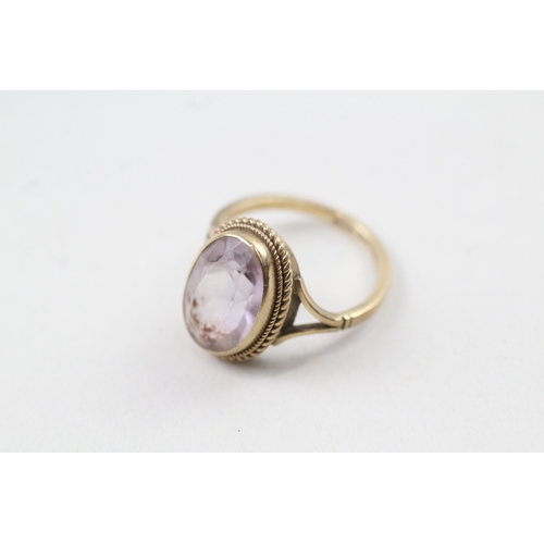 61 - 9ct gold vintage oval cut amethyst dress ring, bezel set (3.8g) AS SEEN - SHANK BENT Size  O