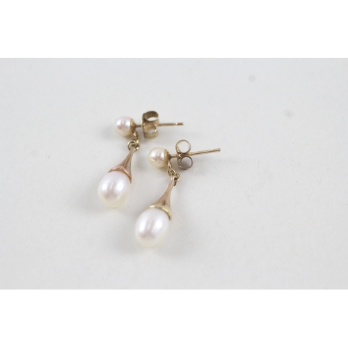 63 - 9ct gold cultured pearl drop earrings with posts (2.2g)