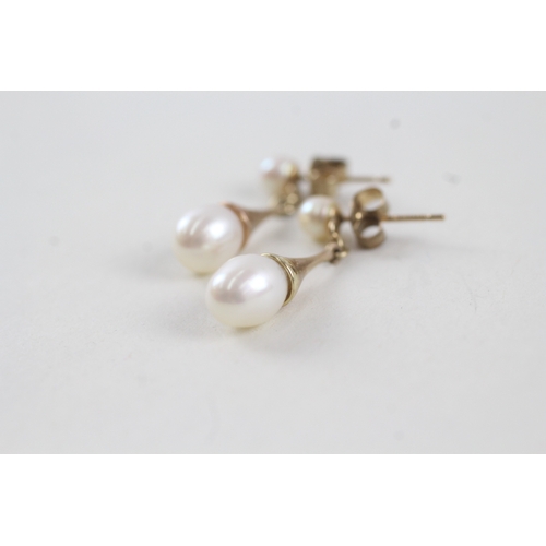 63 - 9ct gold cultured pearl drop earrings with posts (2.2g)