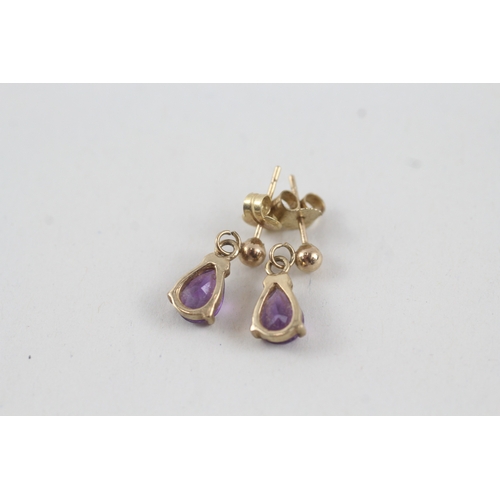 66 - 9ct gold pear cut amethyst drop earrings with posts (1.2g)