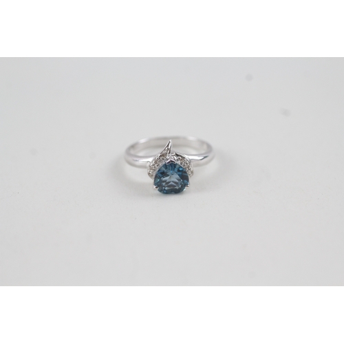 78 - 9ct white gold heart cut blue topaz and diamond dress ring (2.4g) Size  N