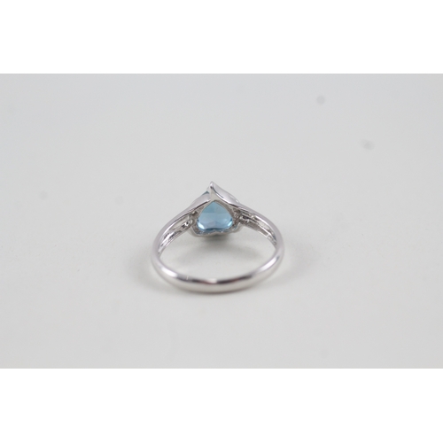 78 - 9ct white gold heart cut blue topaz and diamond dress ring (2.4g) Size  N