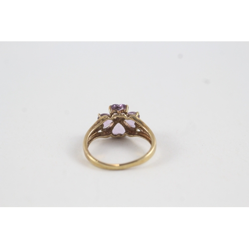 79 - 9ct gold amethyst floral dress ring (2.6g) AS SEEN - MISHAPEN Size  M