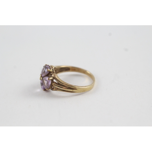 79 - 9ct gold amethyst floral dress ring (2.6g) AS SEEN - MISHAPEN Size  M