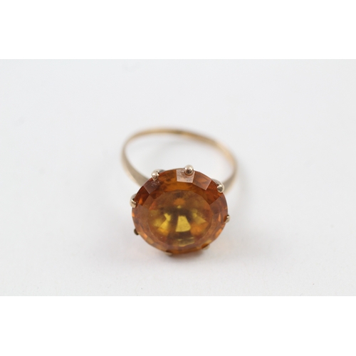 92 - 9ct gold yellow gemstone solitaire ring (4.4g) Size  N 1/2