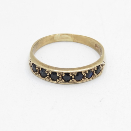 104 - 9ct gold sapphire half eternity ring (2.4g) Size  R