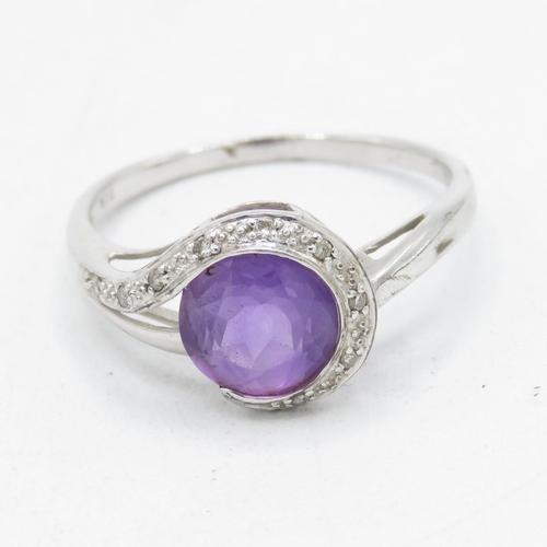 131 - 9ct white gold amethyst and diamond dress ring (2.7g) Size  T