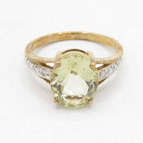 141 - 9ct gold citrine & diamond ring (3.4g) Size  N