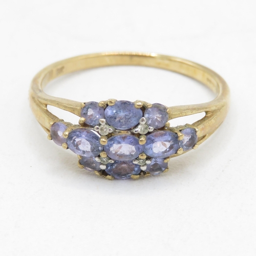 160 - 9ct gold tanzanite cluster dress ring (2.5g) Size  S