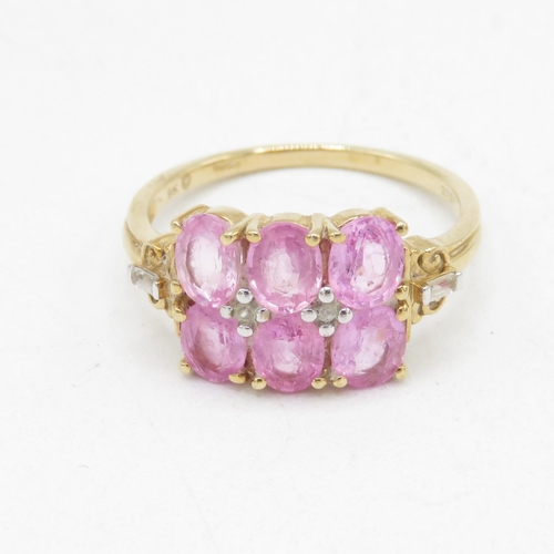 210 - 9ct gold pink sapphire & white gemstone dress ring (2.4g) Size  O