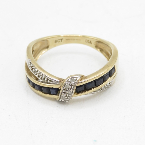 212 - 9ct gold diamond & sapphire crossover ring (3.1g) Size  N